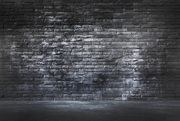 Black Brick Wall and Cement Floor