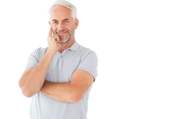 Smiling man posing with arms crossed