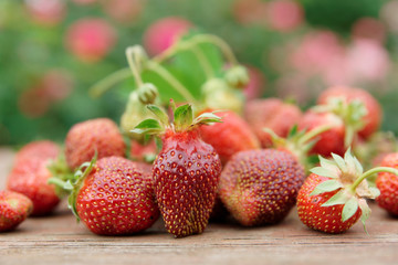 Fresh strawberries on wooden table