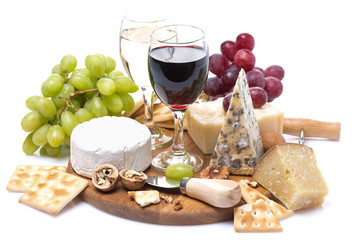 two glasses of wine, grapes, cheese and crackers