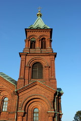 Fototapeta na wymiar Ein Turm der berühmten Uspenski-Kathedrale in Helsinki