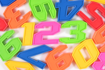 Fototapeta premium Colorful plastic numbers 123 on white