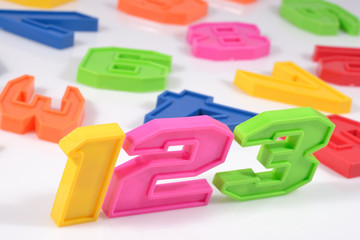 Fototapeta premium Colorful plastic numbers 123 on white