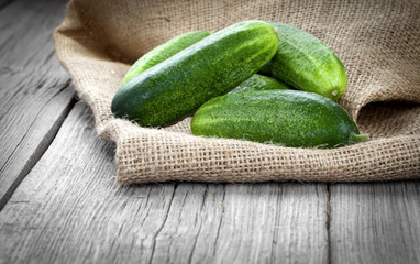 cucumbers on the wooden background