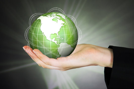 Businesswoman Holding Globe With Binary Code - Powered by Adobe