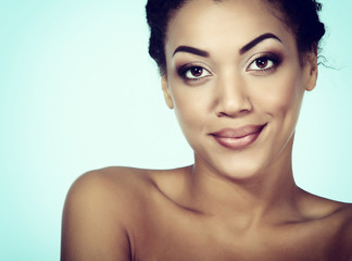 Fototapeta premium Young fresh woman with beautiful makeup looking at camer
