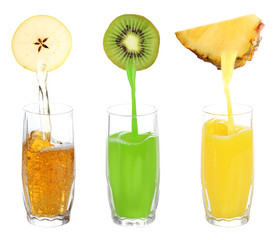 Juice pouring from fruits into glass, isolated on white
