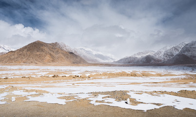 winter desert plain snow mountain