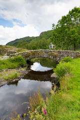 Fototapeta na wymiar Packhorse bridge Watendlath Tarn Lake District Cumbria