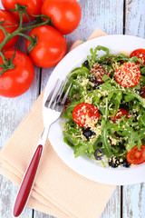 Fresh salad with arugula, close up
