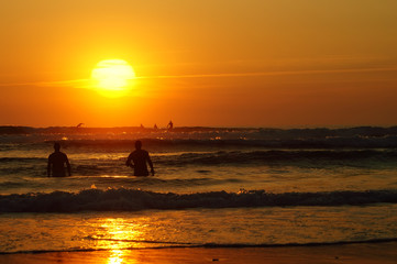 Fototapeta na wymiar Surf in Lacanau at sunset