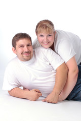 portrait of an ordinary couple over white background