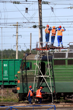working electrical train conductor