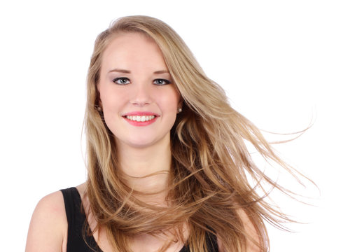 Portrait of young teenage girl posing on white background
