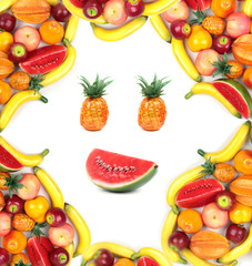 Frame of human face with assortment of various fruits