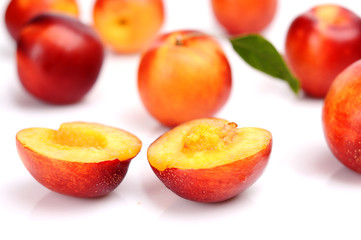 Several sliced nectarines isolated on white