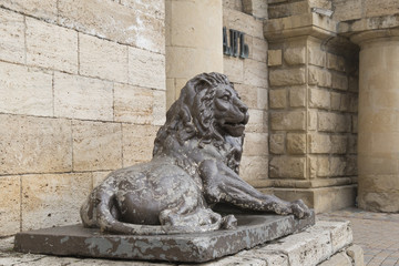 Lion sculpture before  tunnel to the underground lake Proval, Py