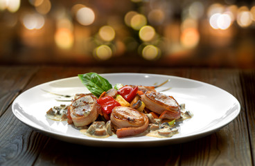 Medallions grilled with vegetables