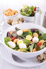 salad with quail egg