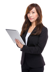 Mature businesswoman use digital tablet