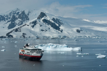 Tourist boat on a summer day in the strait near the Antarctic Pe