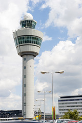 Schiphol airport command tower against cloudy sky - 68769034
