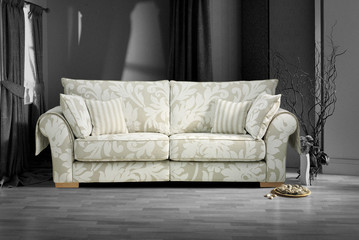 Modern green sofa isolated on white background