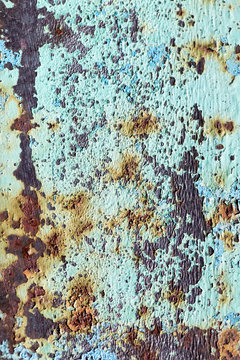 old rusty metal with paint as background © schankz