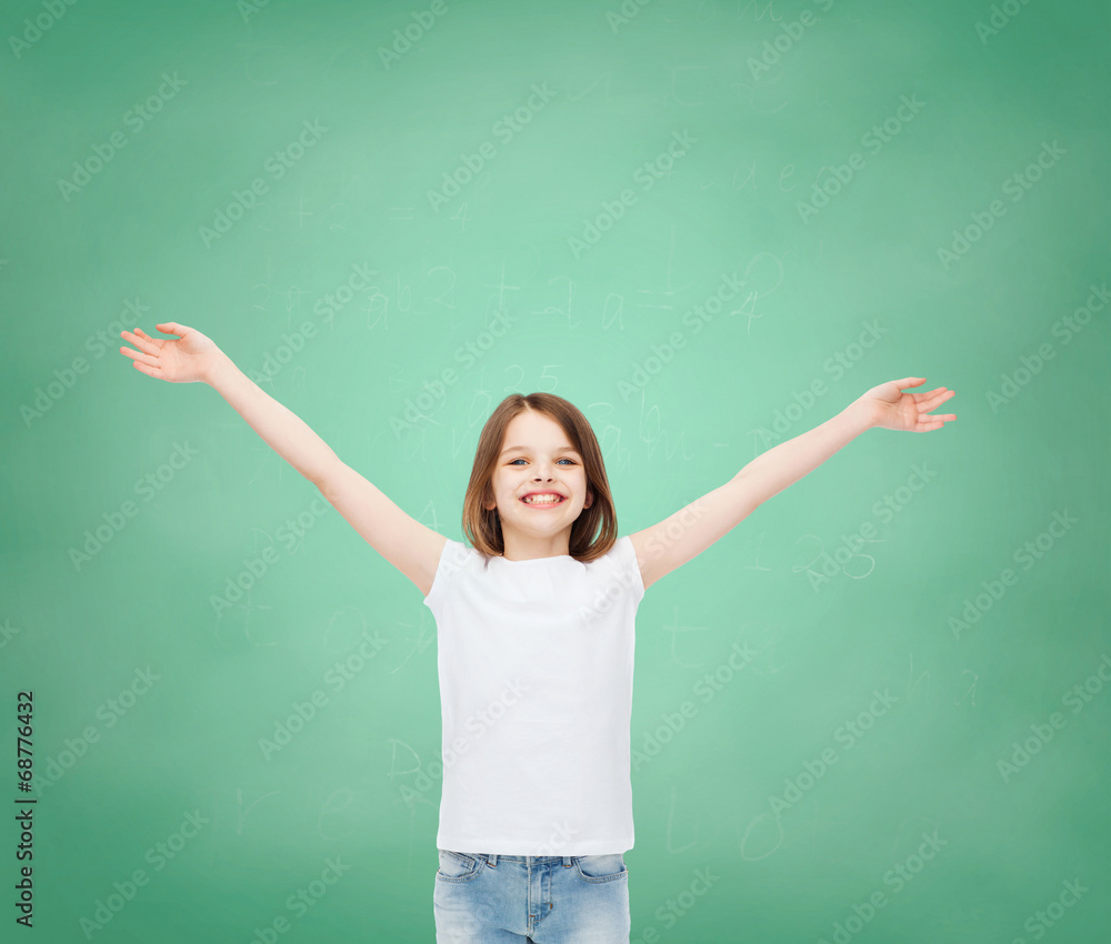 Wall mural smiling little girl in white blank t-shirt