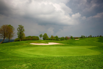 Fototapeta na wymiar On the golf course before heavy storm