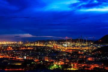 Oil refinery plant at twilight night
