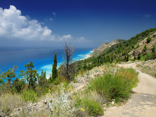 Beautiful turquoise sea and coastal hills with trees