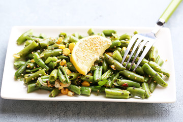 Salad with green beans and corn, sesame seeds