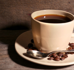 Cup of coffee on rustic wooden background