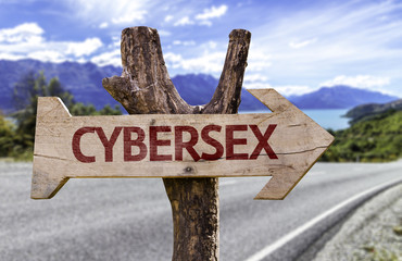 Cybersex wooden sign with a street background