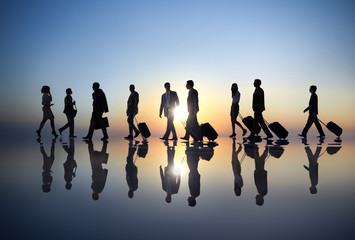 Obraz premium Back Lit of Business People Traveling