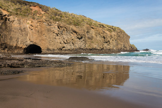 cave at Bethells beach, New Zealand