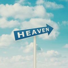 Obraz premium Road sign pointing to heaven