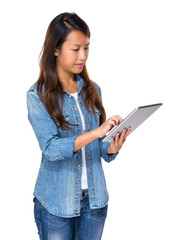 Singaporean woman use digital tablet