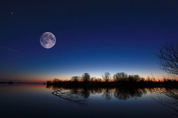 Fototapeta na wymiar night landscape on the river