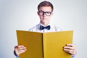 Young man reading book