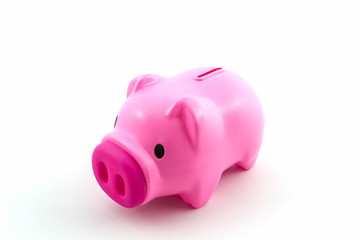 Pink piggy bank saving.