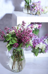 Beautiful lilac flowers in vase,