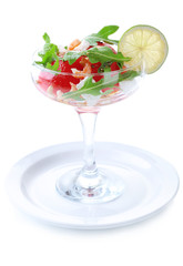 Salad with watermelon, feta, arugula shrimps, balsamic sauce in