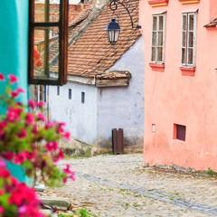 Fototapeta na wymiar Medieval street view in Sighisoara, Romania