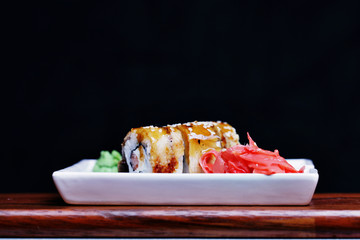 rolls on a plate with black background