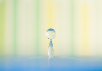 water drop at striped background