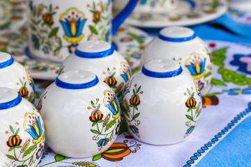 Colorful ceramics in traditonal polish market. - obrazy, fototapety, plakaty