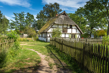 Fototapeta na wymiar Old wooden house in Kluki, Poland