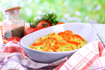 Casserole with vegetables in bowl  on natural background